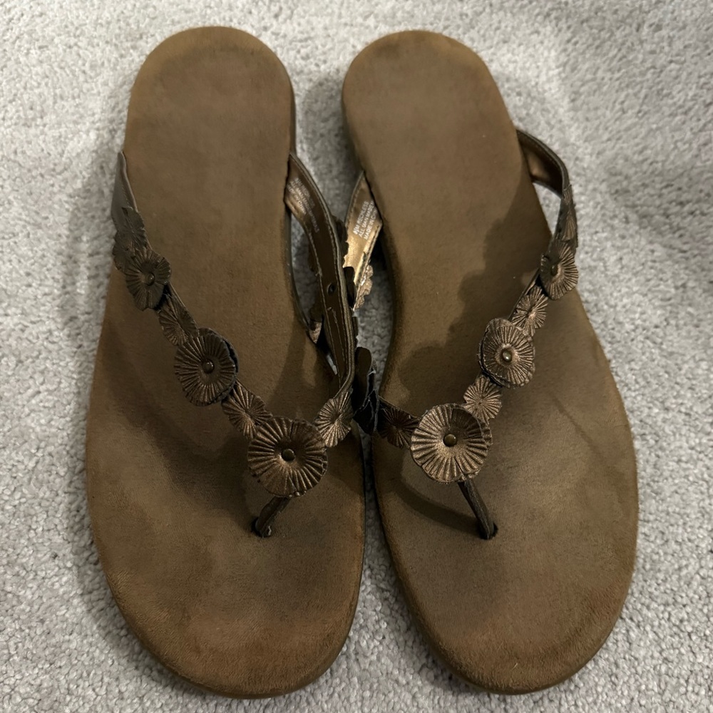 Bronze/copper flip flops with floral accents Size 8-1/2
